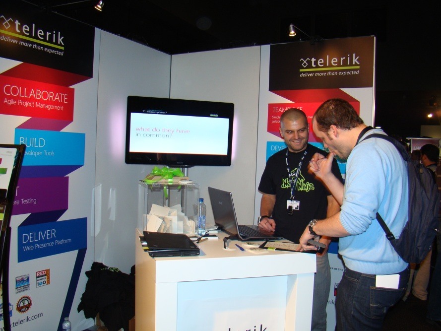 People talking at the Telerik booth - TechDays Belgium