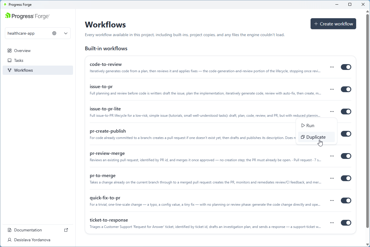 Built-in workflows list with per-workflow toggles and an ellipsis menu containing Run and Duplicate.