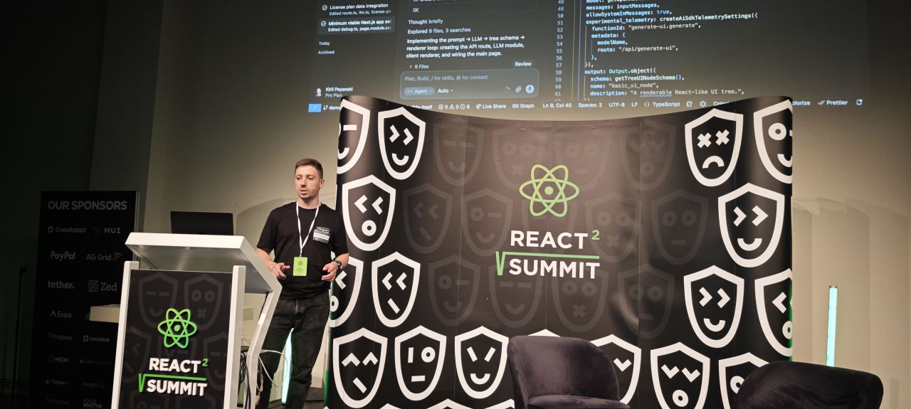 Kiril, on stage at React Summit. 