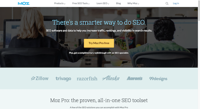 Moz homepage The Moz homepage has a light blue headline over a darkened hero image of two people sitting at a desk. The headline reads: “There’s a smarter way to do SEO.”