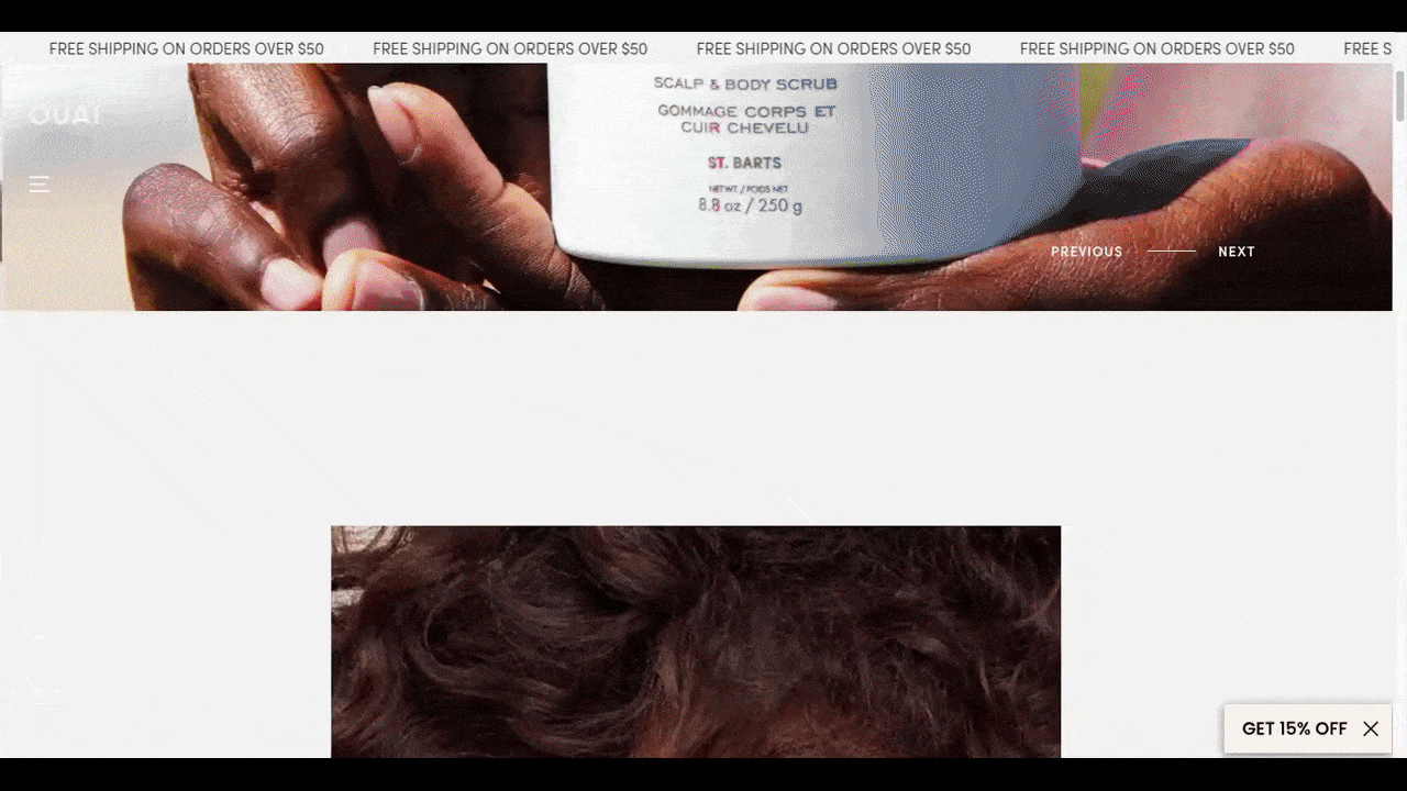 OUAI home page GIF A GIF shows off the home page for the ecommerce company OUAI. The colorful product and model imagery stands out in sharp contrast against the light grey background of the website.