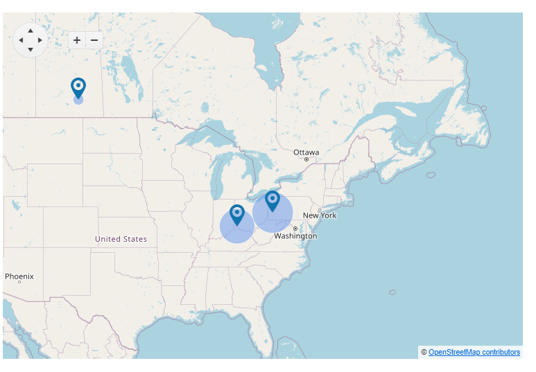 Blazor Map with bubbles The previous map but each marker now points to the center of a blue circle. The circles are different sizes with two large bubbles close to each other in the eastern US and a very small bubble in the middle of Canada
