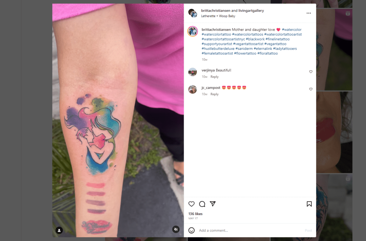 @brittachristiansen watercolor tattoo From the Instagram page of @brittachristiansen. The tattoo is of a mother kissing her daughter. A rainbow watercolor palette fills in some of the details of the two people while also bleeding outside the lines.