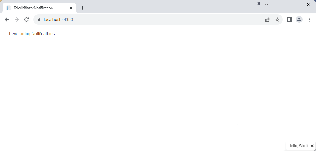 A bare white web page displayed in a browser window. In the lower right corner, the text “Hello, World” is displayed in a box with a light gray border and with a x to the text’s right