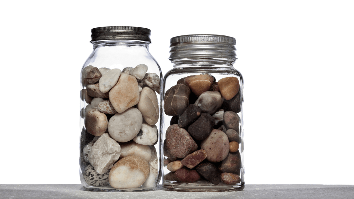 Jars with big rocks A photo of two glass jars containing big rocks and some small stones and pebbles.