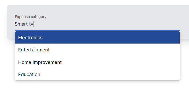 The .NET Smart ComboBox suggests items via semantic match based on the entered Expense category, even if not in the items