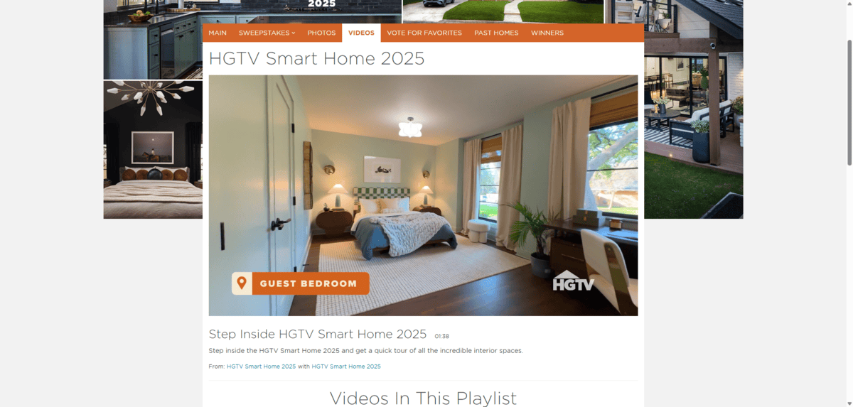 HGTV home walkthrough In this screenshot from the HGTV Smart Home 2025 walkthrough, we see the Guest Bedroom. There’s a bed at the back of the room, two large windows to the right, a spacious area rug in the middle, and a desk in the foreground corner.