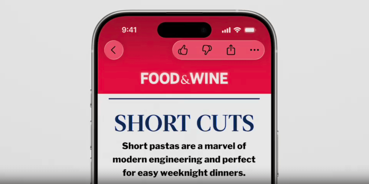 Liquid Glass - red example In this example of Liquid Glass, we see a back button in the top left corner of the phone screen and a toolbar in the top right with icons for Like, Dislike, Share, and More. They sit on top of the red banner at the top of the blog post, so the glass is a reddish hue and the icons are black.