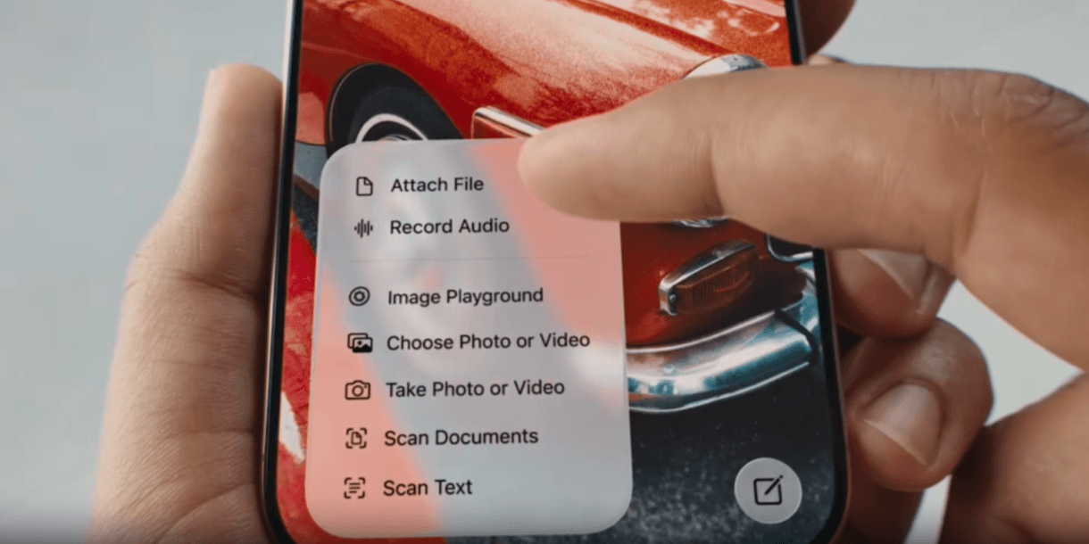 Liquid Glass larger elements A user opens a controls menu on an iPhone. The frosted section makes it easier to see the options for: Attach File, Record Audio, Image Playground, and more.