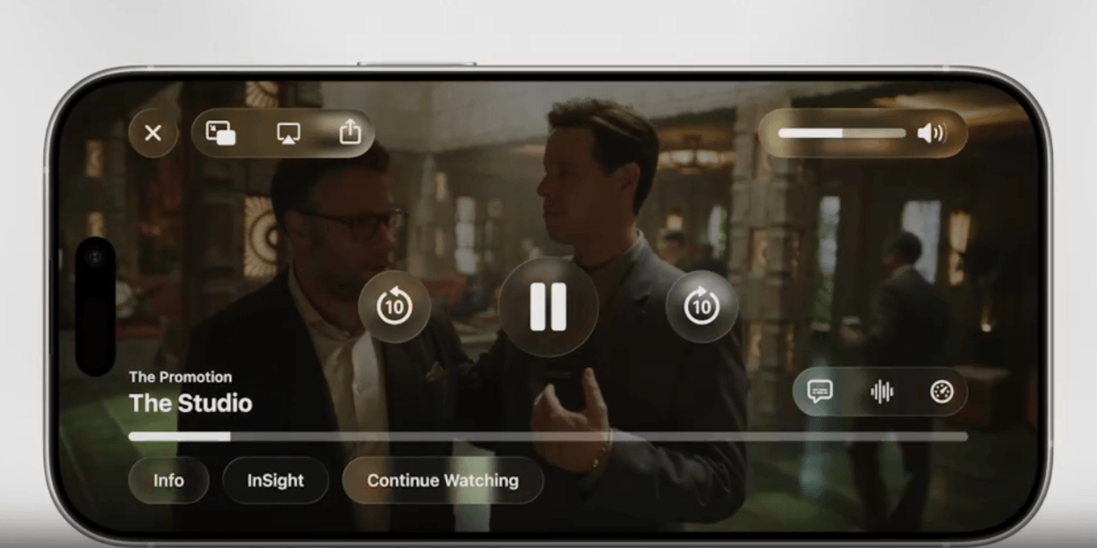 Liquid Glass video player As “The Studio” plays on this video player on an iPhone, we see how different elements have been redesigned for Liquid Glass: “X” exit button, screen sharing options, volume control, video control buttons, info buttons, captions and more.