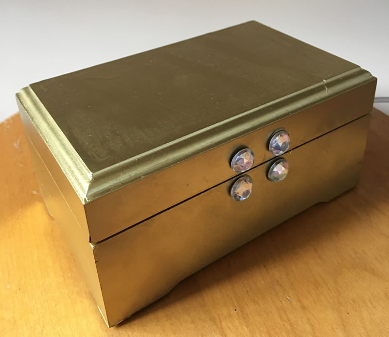 An upcycled wooden gift box makes a great treasure box