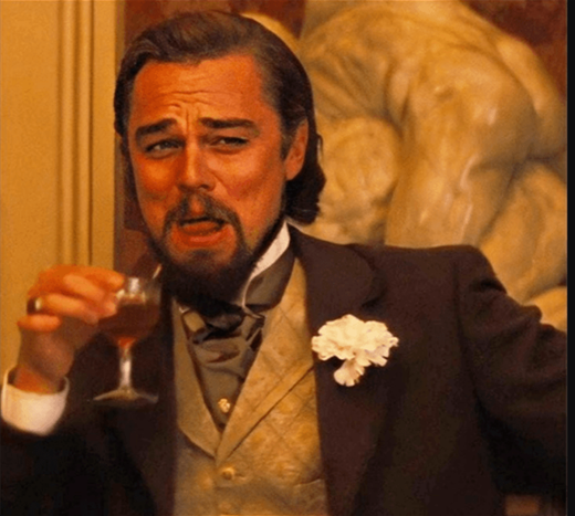 leo Meme of Leonardo DiCaprio laughing and drinking in Django Unchained